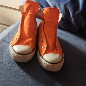 Orange neon converse